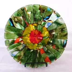 fused glass plate Forest Glen Zinnia - back lit