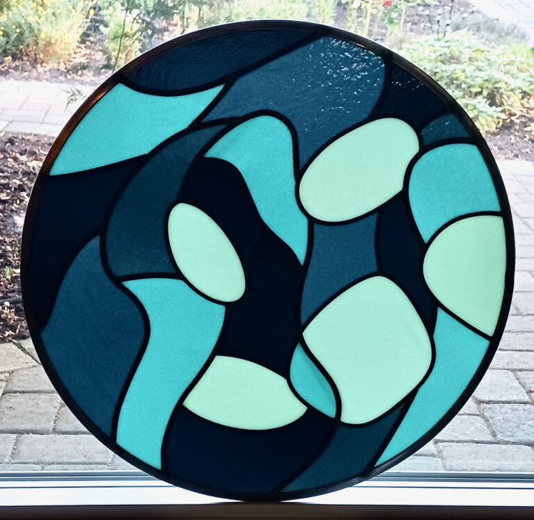 The Watershed Collection: Spring-warmth stained glass pump house window