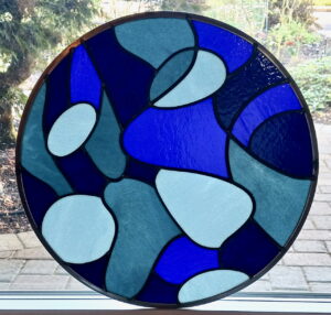 The Watershed Collection: Winter-freeze stained glass pump house window